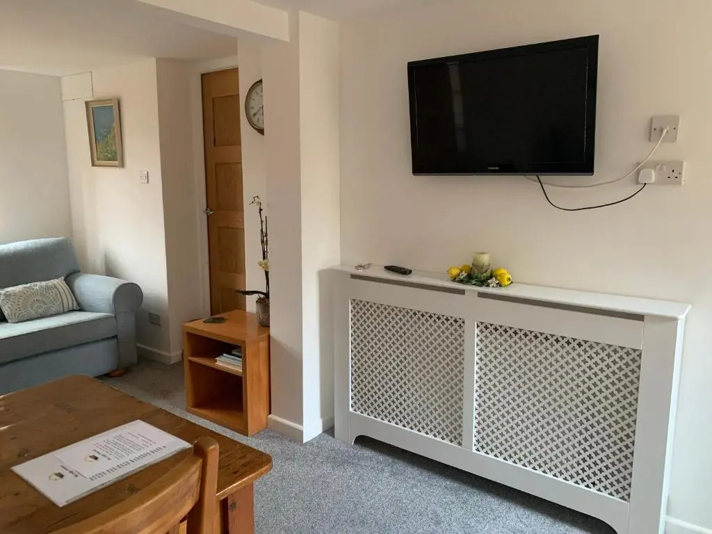 One bedroom self contained annex with own bathroom, sitting room and kitchenette