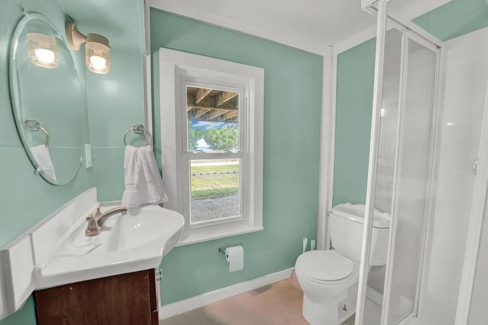 Pet-Friendly Bay View Home w/ Screened Pool Near Lighthouse