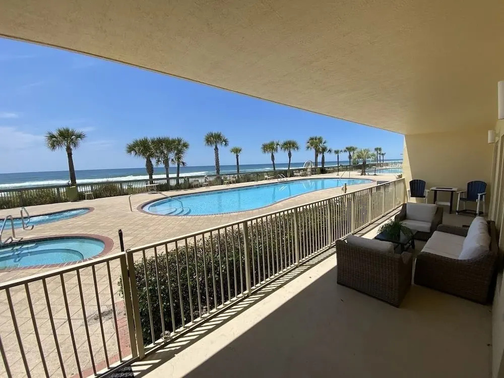 Wonderful Tropical Condo with Beach and Fitness Center Access - Unit 0102 by RedAwning