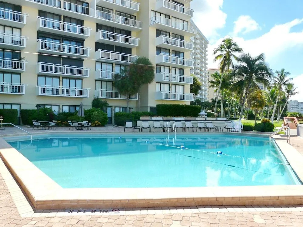 Inviting Beachfront Condo With Large Balcony and Pool