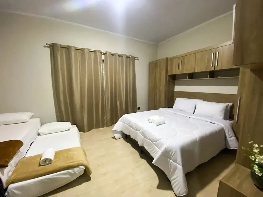 Casa Central piscina e AC para 8 hospede