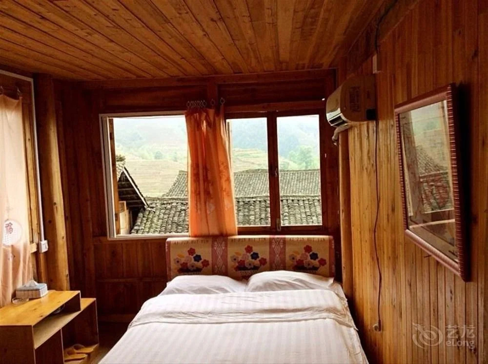 Longsheng Zhaihualou Inn