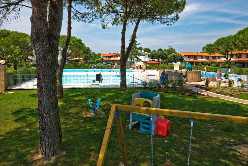 Resort With Shared Garden and Swimming Pool