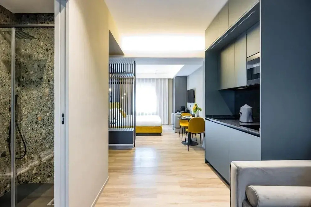 MH SUITES Plebiscito