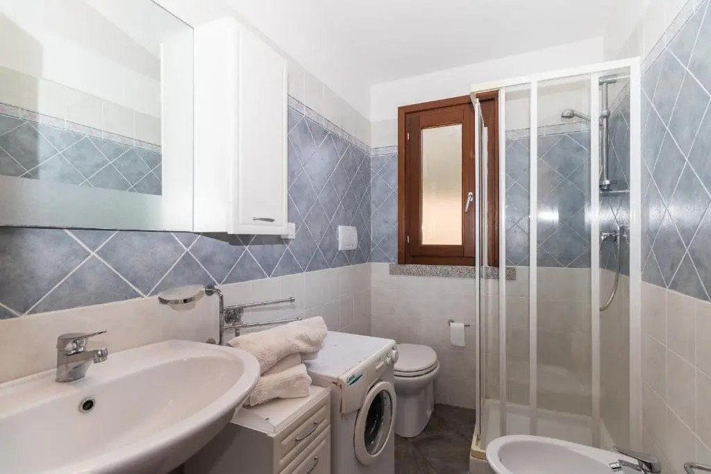 Appartamento con piscina 14