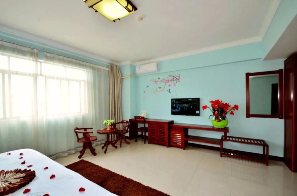 Sanya Jiulixiang Business Hotel