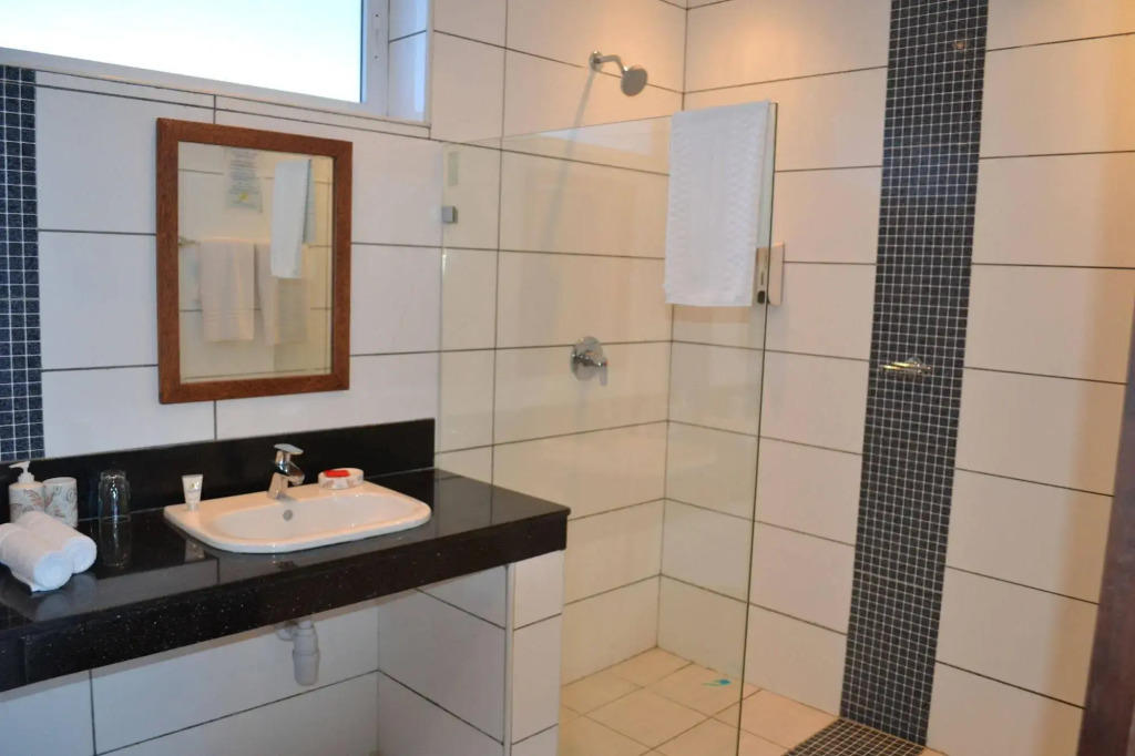 Cowrie Shell Beach Apartments Official