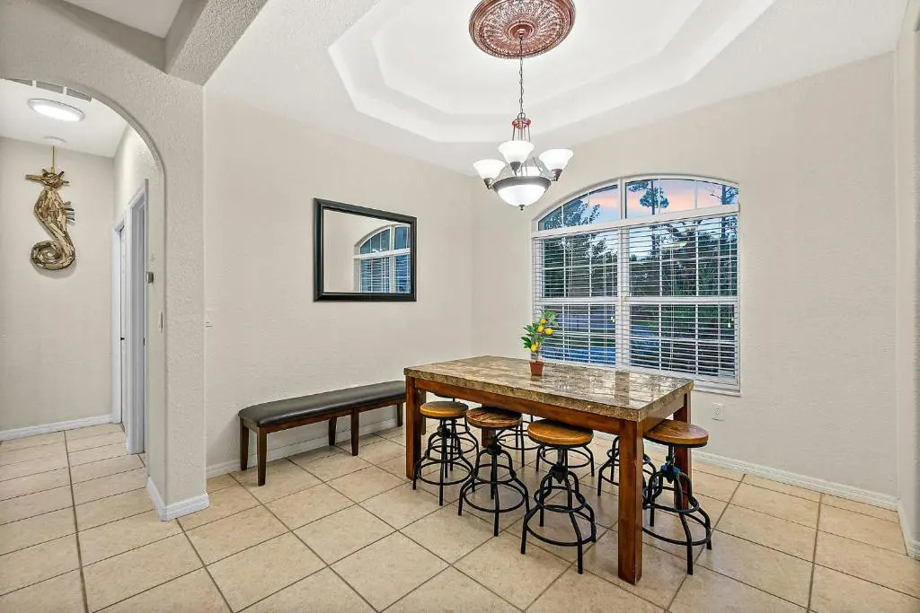 Palm Paradise with Heated Saltwater Pool - 10 min to the Beach