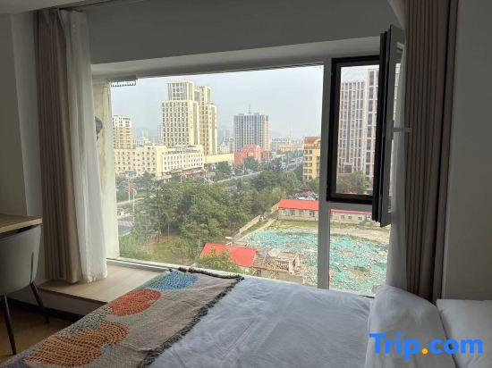 Weihai Jiaqi Hotel (Weihai high speed railway bus terminal store)