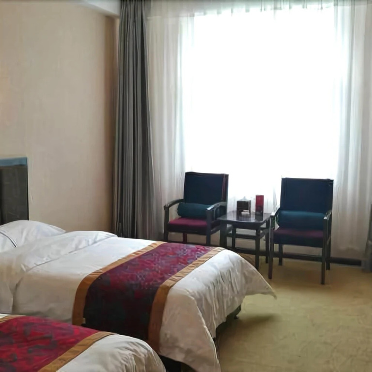 Yading Yizhan Hotel