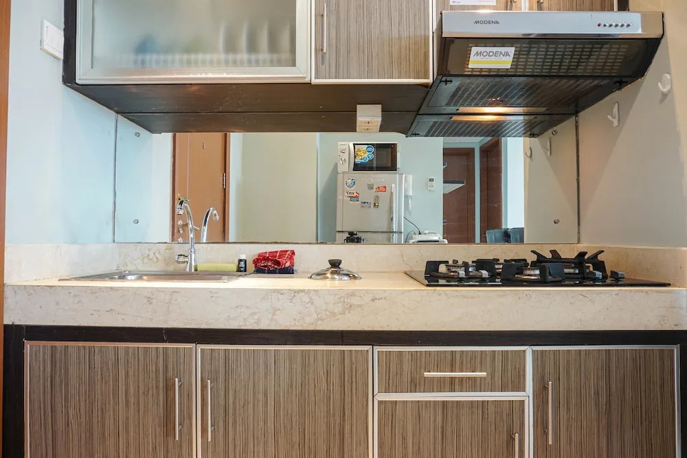 Best Location and Cozy 2BR The H Residence Apartment By Travelio