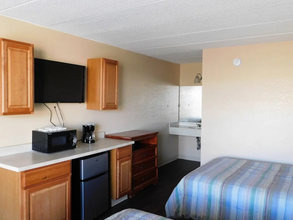 APM Inn and Suites