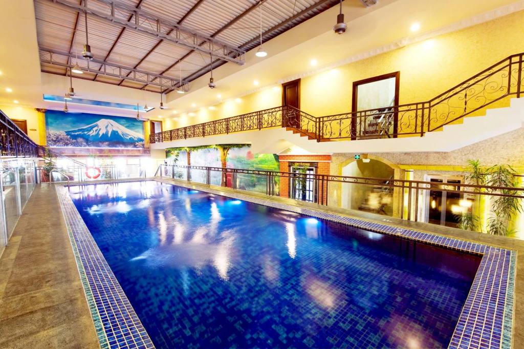 Amos Cozy Hotel & Convention Hall