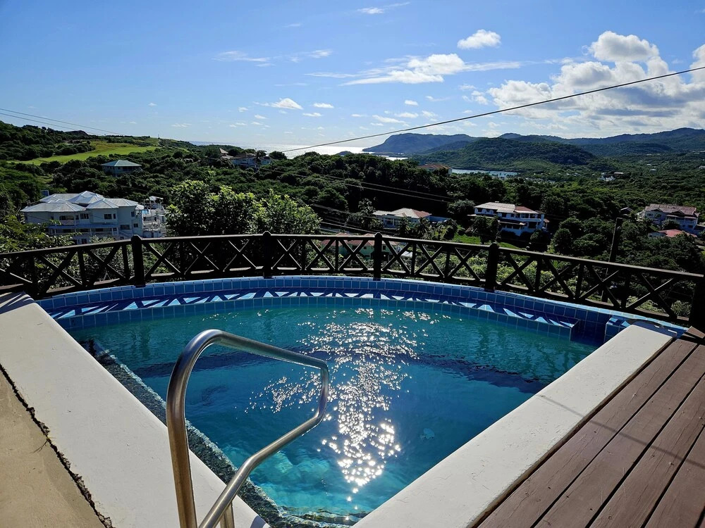 Charming Cottage Located In Cap Estate - Orchid Cottage 1 Bedroom Home by RedAwning