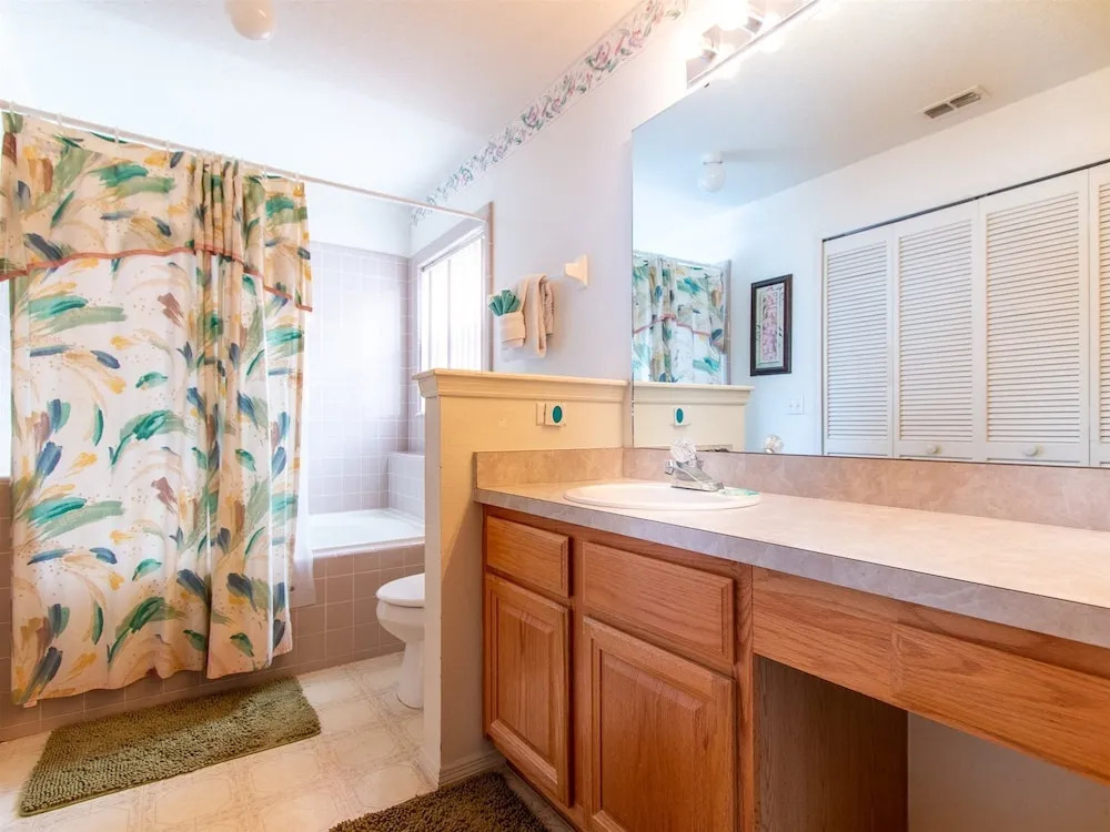 3 Bedroom Home With Private Screened Pool With Rock Waterfall Feature and Gameroom by Florida Dream Homes