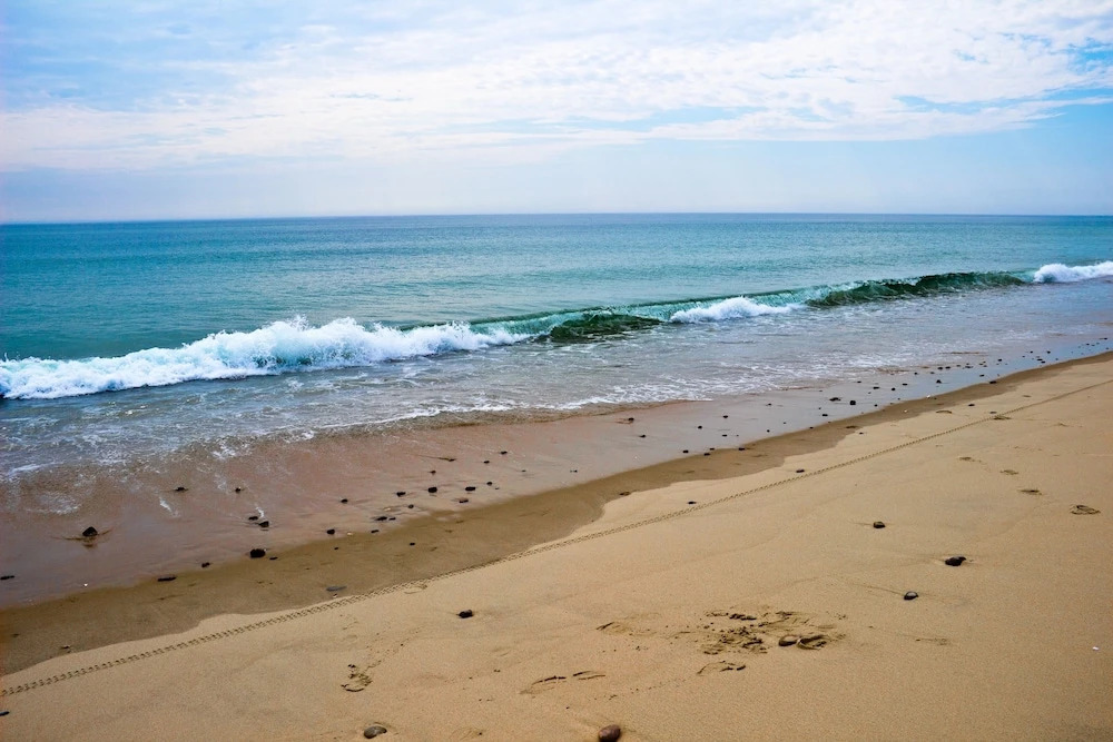 Coastal Charmer W/ Lovely Bay Views & Porch 3 Bedroom Home