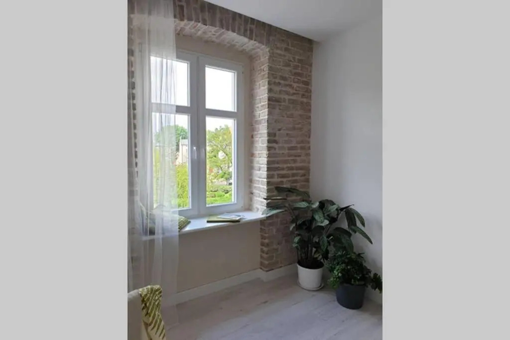 Apartament w kamienicy Przy Plantach