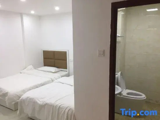 Xinzheng Yibai Hotel