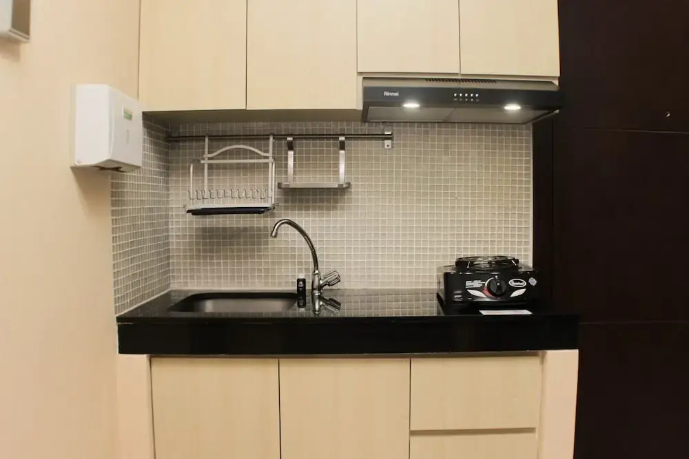Nice and Comfort 1BR at Sky Terrace Apartment By Travelio