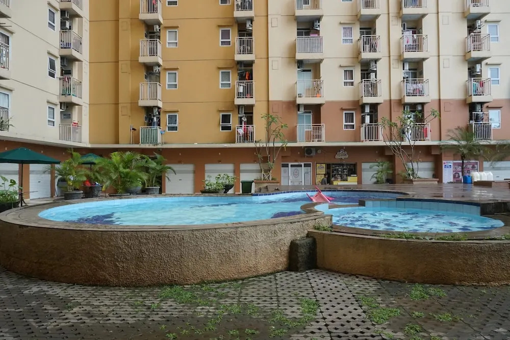 Homey Studio Apartment At Green Palm Residence