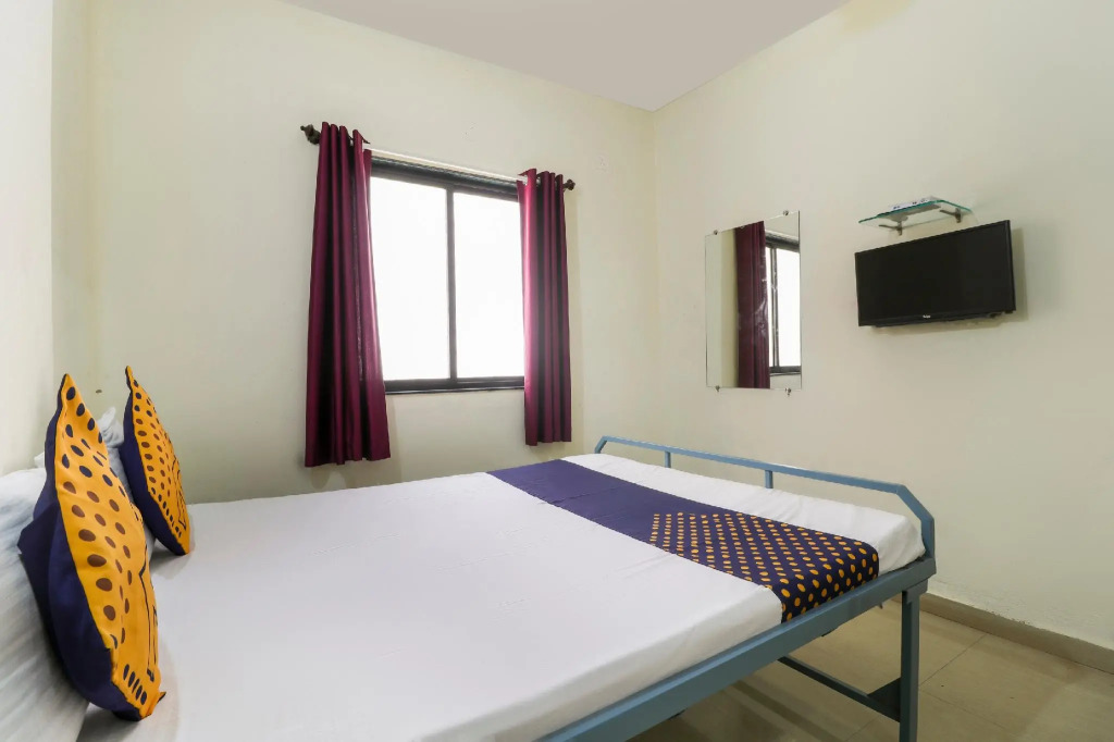 SPOT ON 37095 Sai Sidhi Lodge