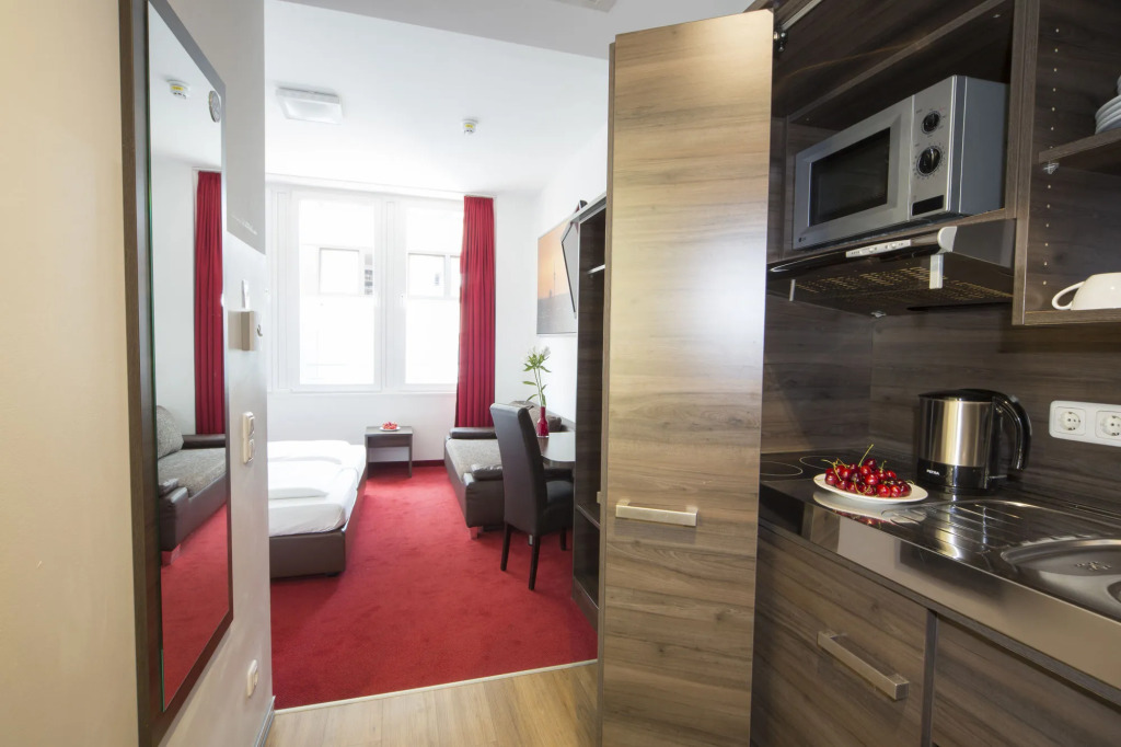 KOOS Hotel&Apartments - City Aparthotel