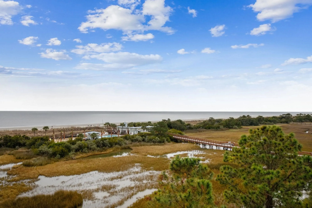 Sleeps 24, Private Beach Boardwalk, Infinity Pool 20 Bradley Cir by Avantstay