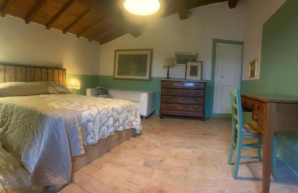 Casa del Piano Valle dei Calanchi in front of Civita Di Bagnoregio
