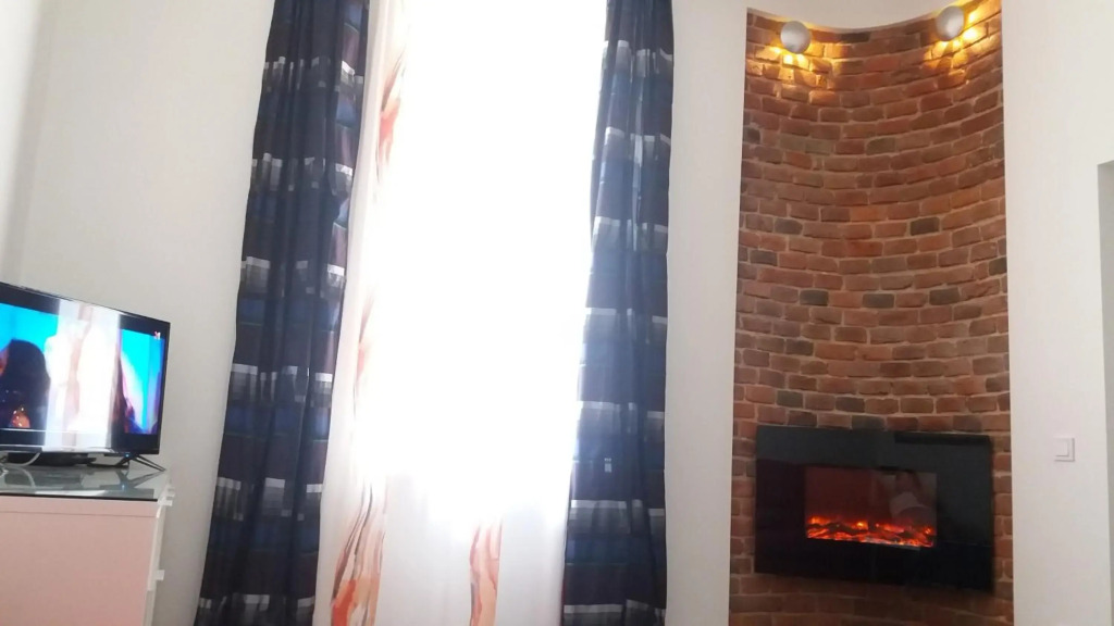Apartment with fireplace