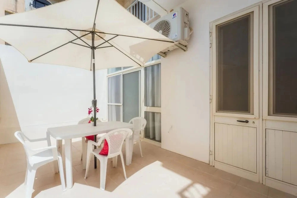 Seafront Gozo Escape BBQ Backyard by Qbajjar Bay