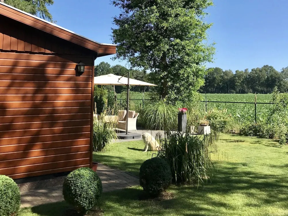 Chalet in Holiday Park With Spacious Living Room, Large Enclosed Garden and Unobstructed View