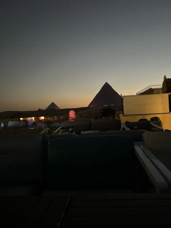 Pyramids Palace view inn With Rooftop Access & free airport pickup
