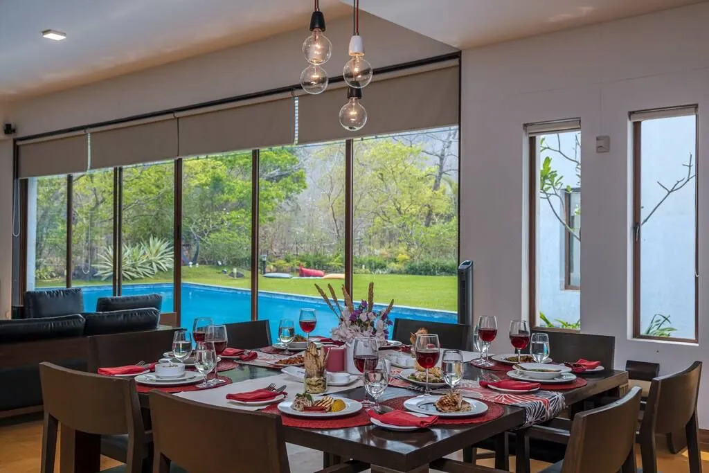 SaffronStays Casa Del Palms - 8BR luxury pool villa with gazebo, pickleball, bar & lawns near Nagaon Beach