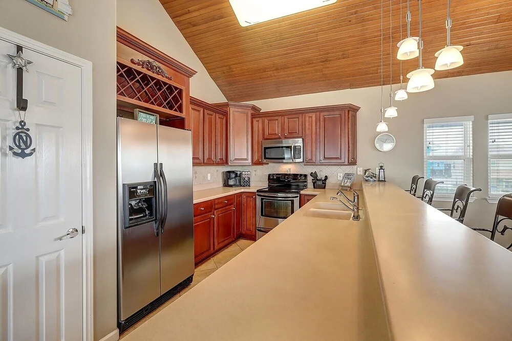 Twin Dolphin Cove 4 Bedroom Home by Redawning