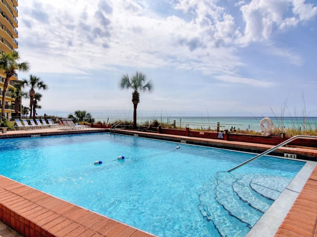 Commodore Resort #704 by Book That Condo