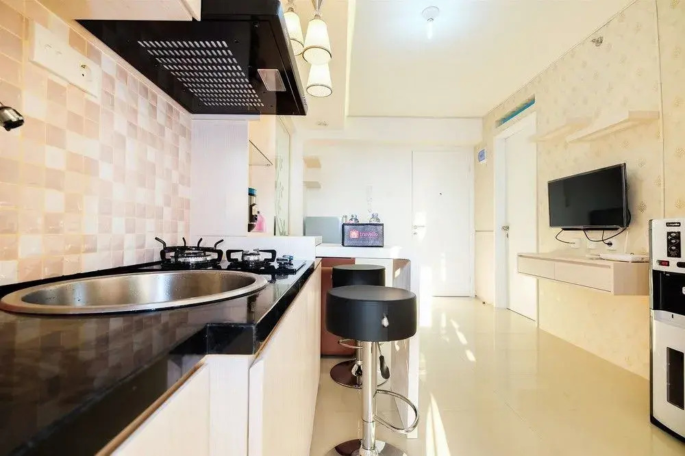 2 Bedrooms at Bassura City Apartment with Mall Access By Travelio