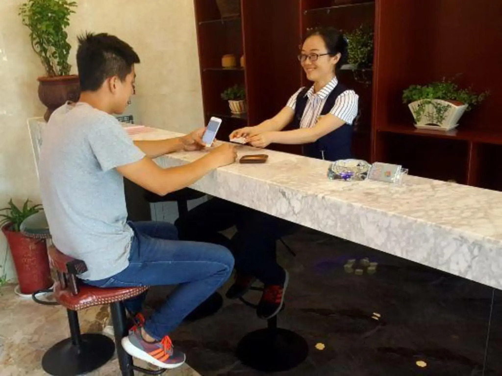Huanle Business Hotel