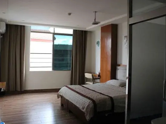 Shuoyu jiari Hotel (Danzhou bus station)