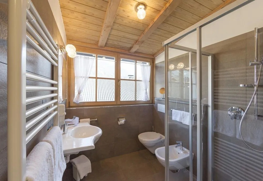 Aparthotel Familiaris - Family Apartments - Pools & Spa in Dolomites