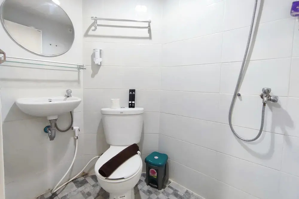 Homey 1BR without Living Room at Amartha View Apartment By Travelio