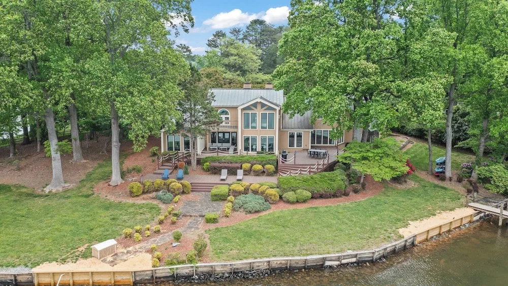 Waterfront Stay w/ Canoes, Deck, Game Room & Lake Views Near Mooresville Renwick Cove by Avantstay