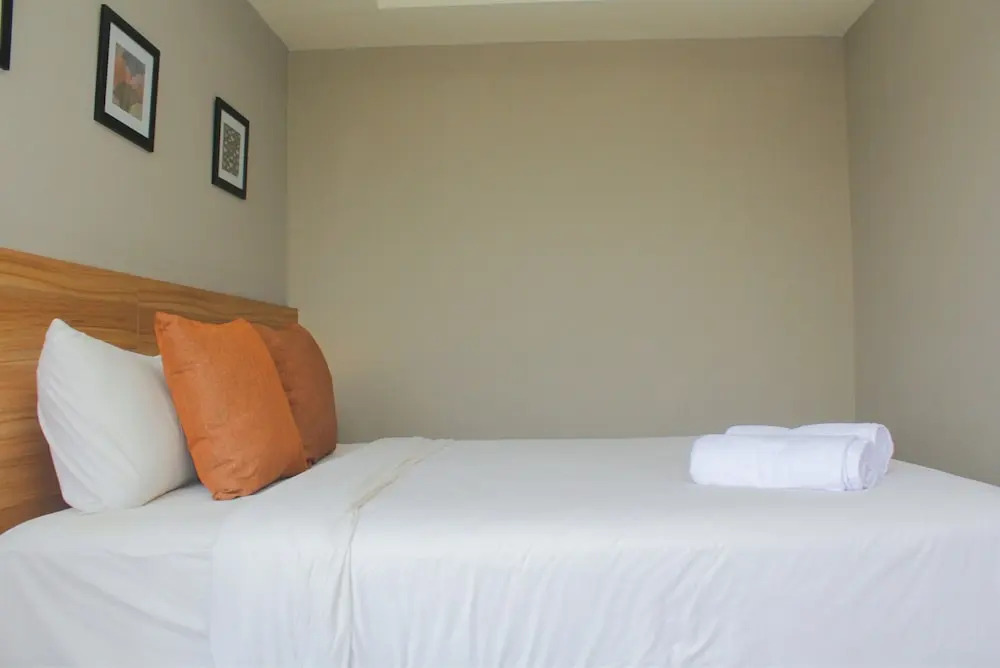 Japanese Style 1BR Apartment at Mustika Golf Residence By Travelio