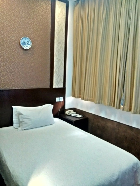 Baolong Homelike Hotel (Youyi Branch)