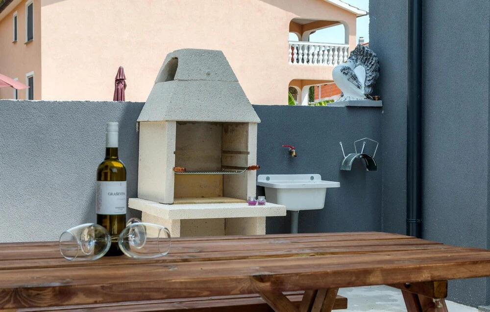 Amazing Home in Peroj With 4 Bedrooms, Wifi and Outdoor Swimming Pool