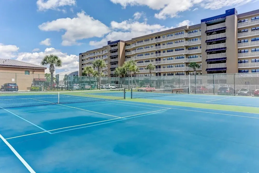 Fully Remodeled Condo with Atlantic Ocean View and Access to Private Fishing Pier by RedAwning
