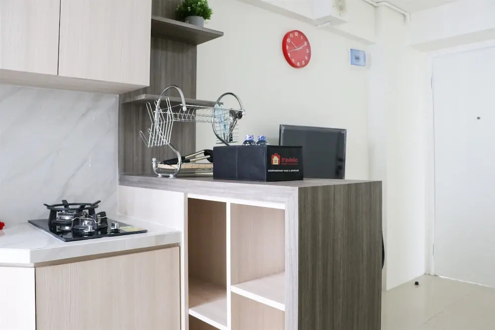 Cozy and Beautiful 2BR Bassura City Apartment By Travelio