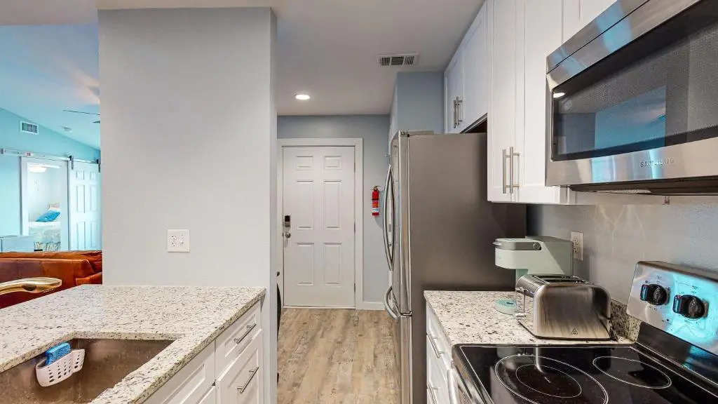 AH-E217 Remodeled Second Floor Condo, Across From The Shared Pool & Hot Tub