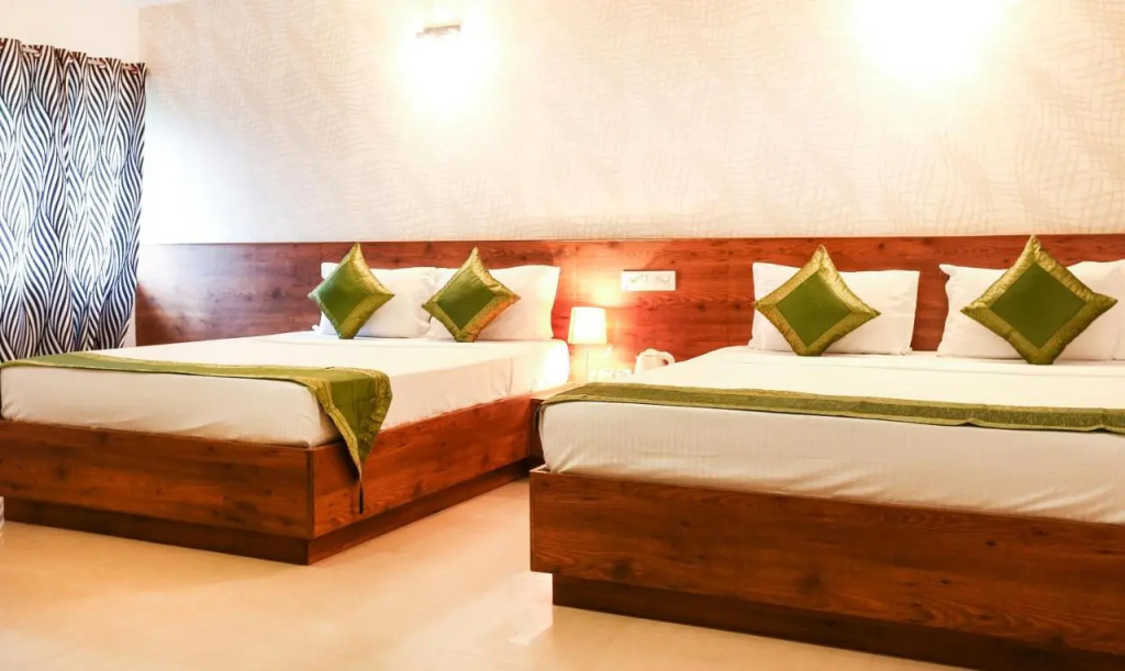 Treebo Comforts Inn, University Road Deralakatte