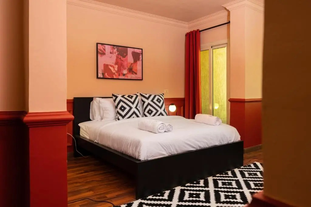 Distinct & Decent 2 BDR Apt Steps From Nightlife and Airport