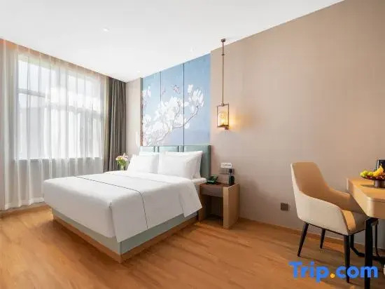 Magnotel Hotel (Taian Xintai Qingyun Shopping Center Jindou Road)